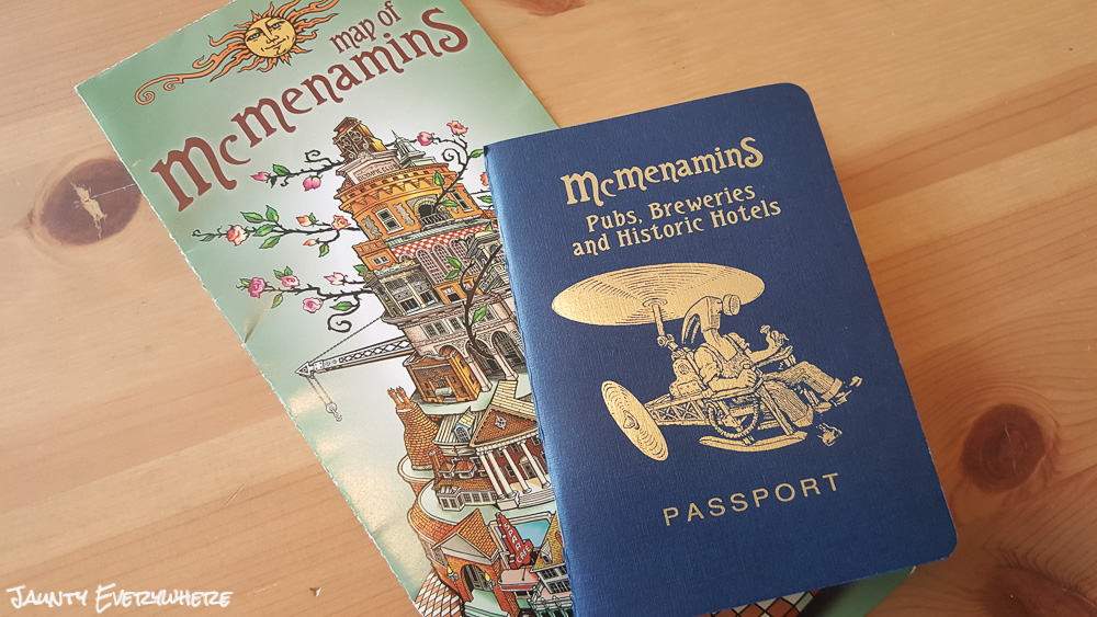 A blue McMenamins passport and brochure