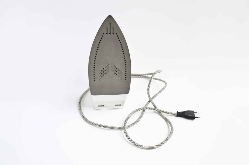 Clothing iron with a winding cord