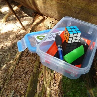 geocacheing is a great outdoors activity for families, box of tresure to trade
