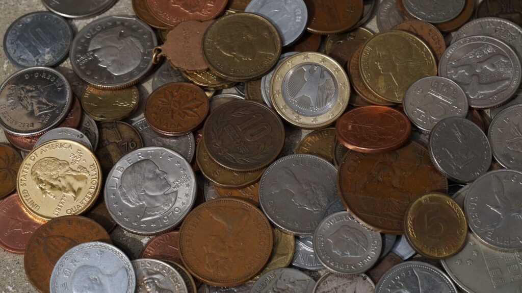 a pile of foreign coins