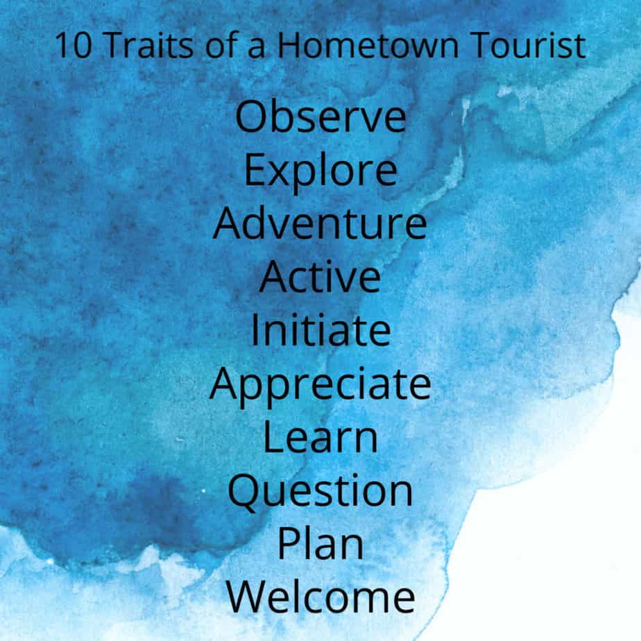 Graphic of the 10 Traits of a Hometown Tourist. Blue watercolor background