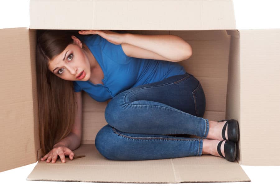 woman in a cardboard box